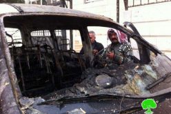 SIsraeli settlers set two cars ablaze and wrote offensive slogans on houses walls in Deir Jarir village