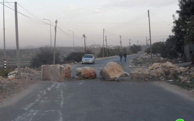 Shutting down the entrance of Izbet et-Tabib by rocks and road blocks