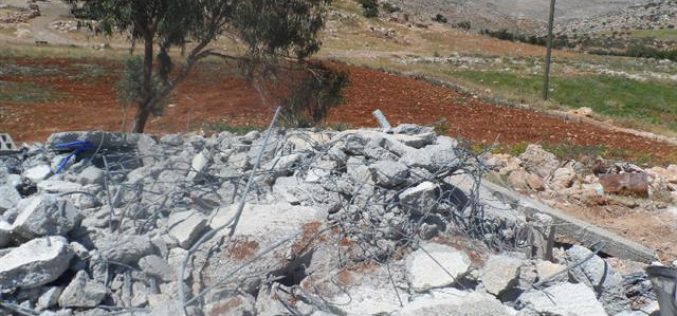 Demolishing a mosque and a number of agricultural and residential structures in Khirbet al Taweel