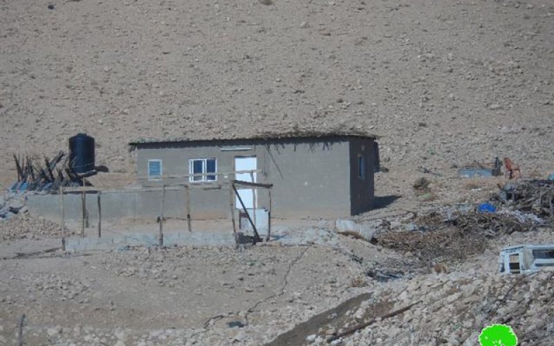 Notifying a residence with stop work in the village of al-Jiftlik