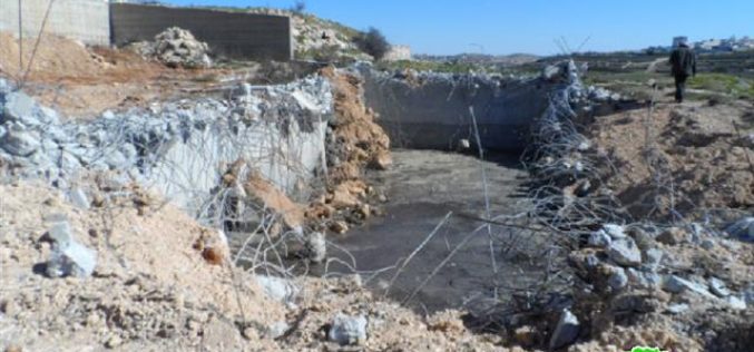 The Israeli occupation demolishes a water cistern in Hebron
