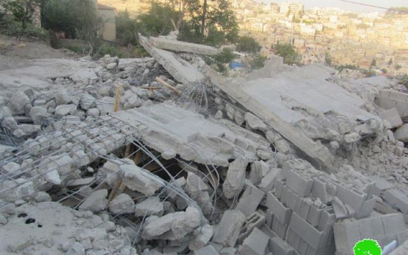 Demolition of a three story building in the Jerusalem neighborhood of Wad Qaddum