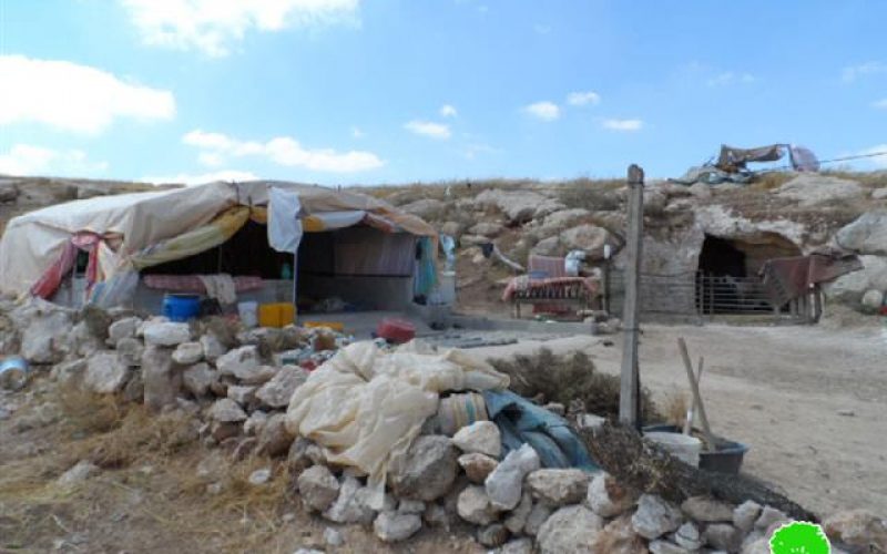 Stop-work order on a residential tent and a cave in the Hebron village Yatta