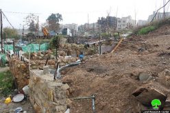 The Israeli occupation municipality in Jerusalem demolishes a residence in neighborhood of Al-Sheikh Jarrah and dumps earth onto it