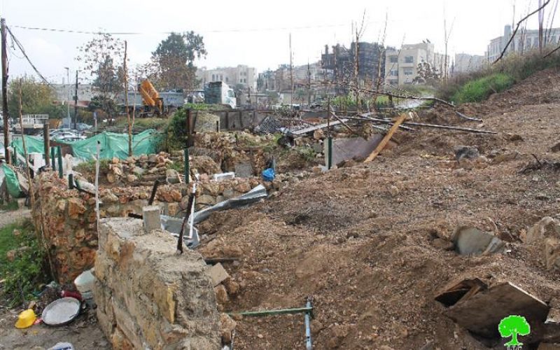 The Israeli occupation municipality in Jerusalem demolishes a residence in neighborhood of Al-Sheikh Jarrah and dumps earth onto it