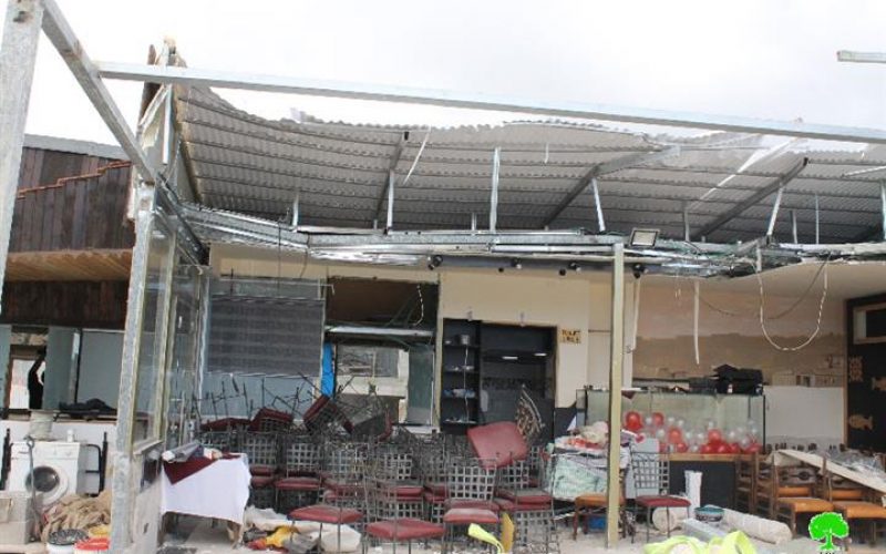 The Israeli Occupation dozers demolish part of a restaurant in Jerusalem