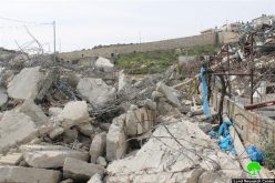 Israeli occupation bulldozers demolish under construction building in the Jerusalem town of At-Tur