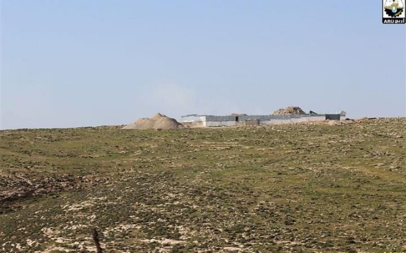 Israeli settlers construct a new bypass road on lands of Kisan village