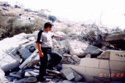 Israeli army and Jerusalem Jewish Municipality officials forcibly evacuate three Palestinian families and destroy their houses.