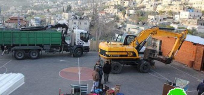 Israeli troops demolish a playground and a cultural café in Wadi Hilwa