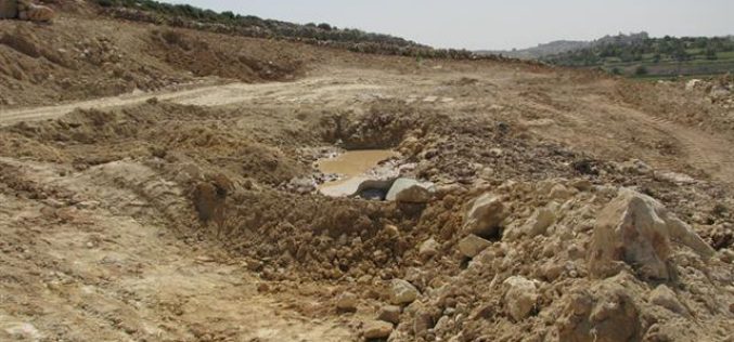 The Israeli Occupation Army Demolishes Two Cisterns in Halhul