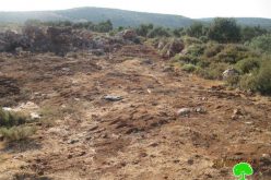 Israeli Settlers stealing soil from Palestinian fields in Wadi Qana