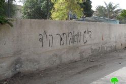إحراق 6 مركبات فلسطينية وجرار زراعي وخط شعارات تحريضية على جدران منازلقريتي مرج الغزال والزبيدات