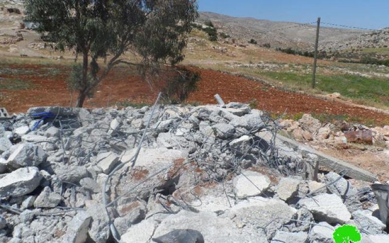 Demolishing a mosque and a number of agricultural and residential structures in Khirbet al Taweel