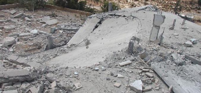 The Israeli occupation blows up two houses and seals off another house with concrete