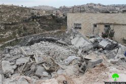تحت ذريعة عدم الترخيص, بلدية الاحتلال تهدم بناية سكنية في منطقة وادي الحمص في قرية صور باهر