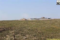 Israeli settlers construct a new bypass road on lands of Kisan village