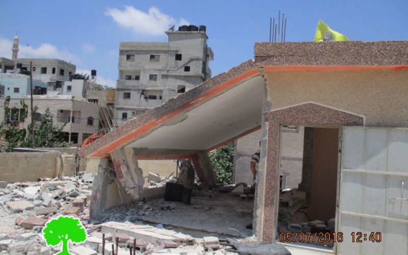 Israeli Occupation Forces demolish two residences in Qalandiya Camp on “Security” claims