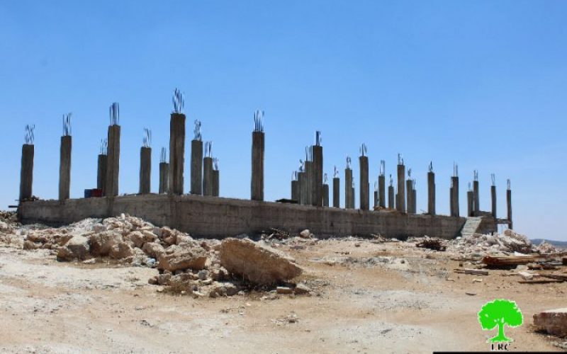 Israeli Occupation Forces confiscate construction materials from Al-Samou’ town in Hebron