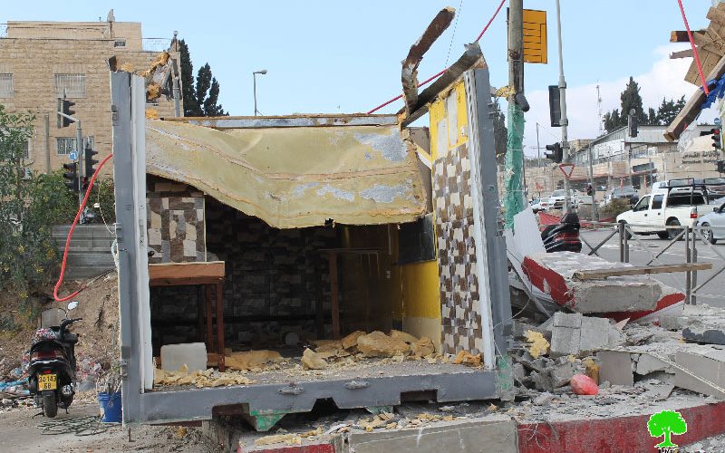 Dozers of Israel Municipality demolish a container used as food truck in Jerusalem