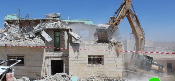 Israeli occupation forces demolish two residences in the Hebron town of Yatta on security claims
