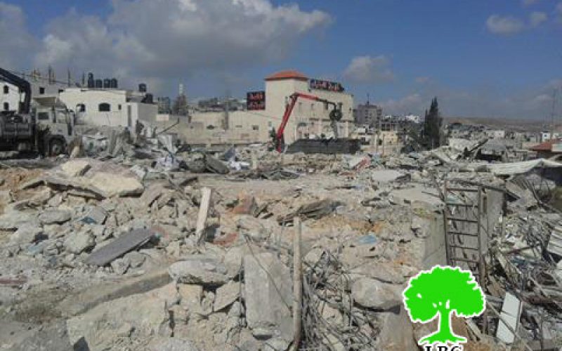 Israeli Occupation Forces demolish structures in Qalandiya Refugee Camp, north Jerusalem