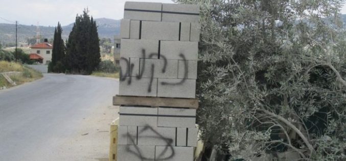 Price Tag colonists torch a dozer and write hatred inciting slogans in Nablus city