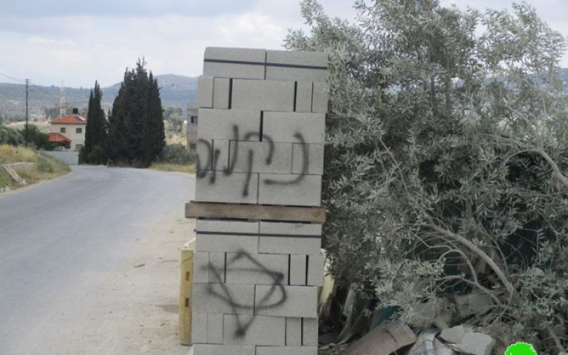 Price Tag colonists torch a dozer and write hatred inciting slogans in Nablus city