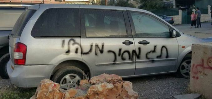 Israeli colonist slash tires of Jerusalemite cars and write  insults against Prophet Mohammad (PBUH) in Shu’fat village in Jerusalem
