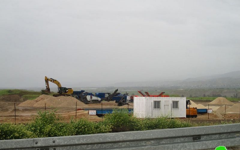 An Israeli contracting company establishes a stone crusher on Palestinian lands of As-Sakut