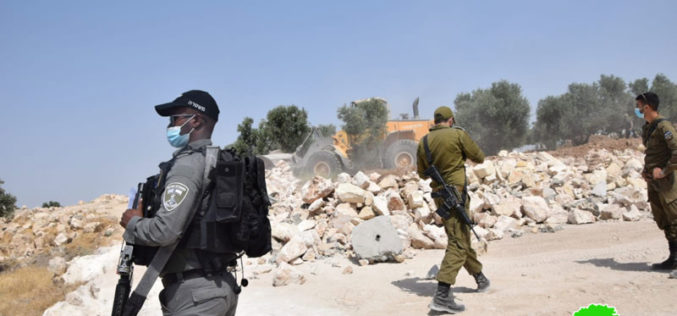 The Israeli Civil Administration demolishes retaining walls in Zif area South Hebron