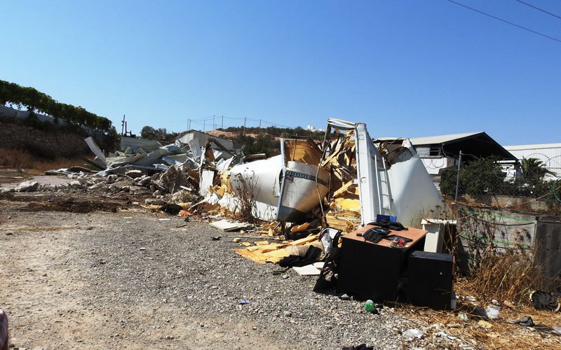 The Occupation Machineries Leveled down a Garage in Hebron