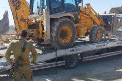 The Occupation Forces confiscated an excavator in Ad-Dirat village east Yatta / Hebron Governorate