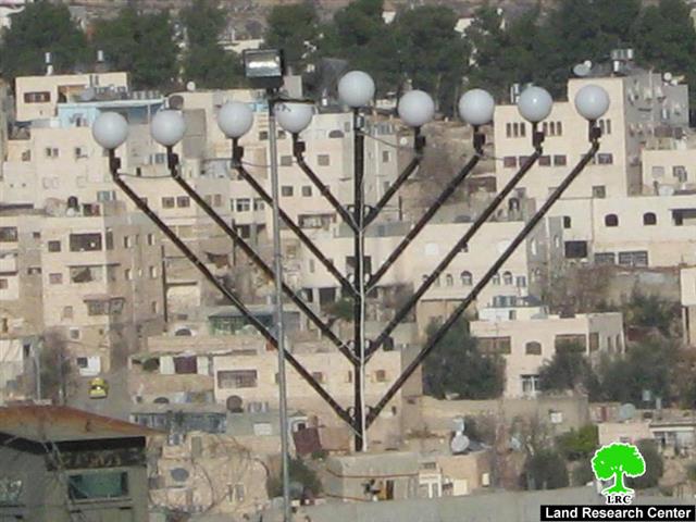 Setting up of a Jewish Hanukah at the top of at Takruri mountain in Hebron’s old city