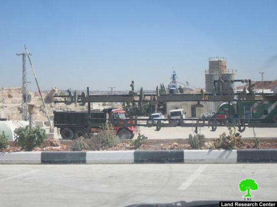 The Israeli Occupation Authorities confiscated a dozer and a mixer truck from Qindeel Concrete Factory in Rafat village