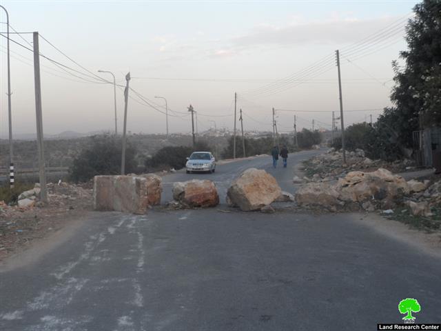 Shutting down the entrance of Izbet et-Tabib by rocks and road blocks