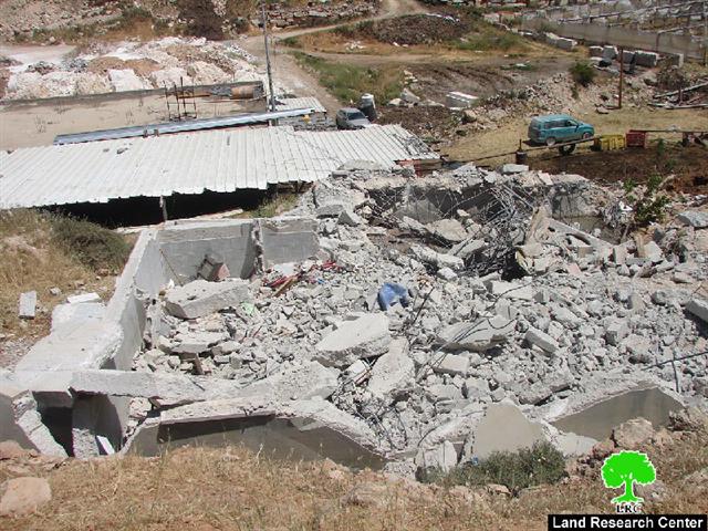 The Israeli occupation demolishes a house and water cistern in Hebron