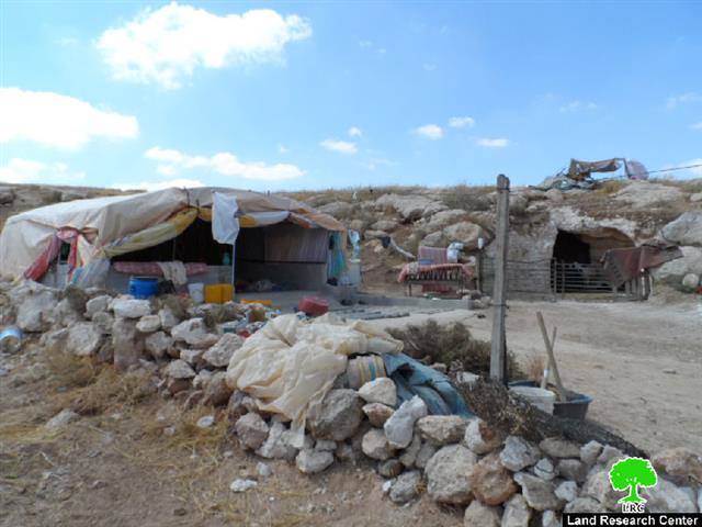 Stop-work order on a residential tent and a cave in the Hebron village Yatta