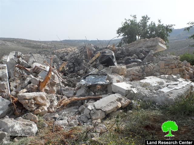 Israeli Occupation Forces demolish three houses and retaining wall in Nablus