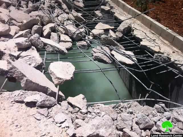 Demolishing a Cistern in Beit Hanina north of Jeruaslem city