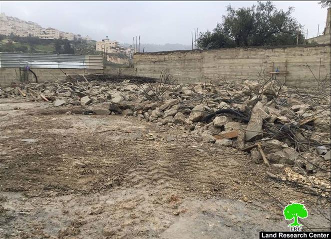 The occupation dozers demolish an under construction residence in the Jerusalem Wad Qaddum neighborhood