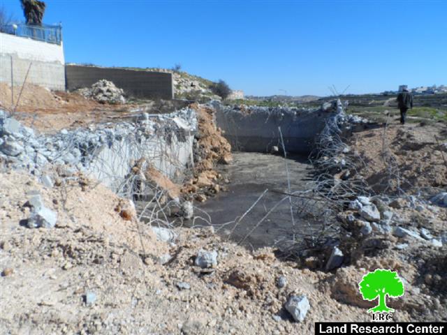 The Israeli occupation demolishes a water cistern in Hebron