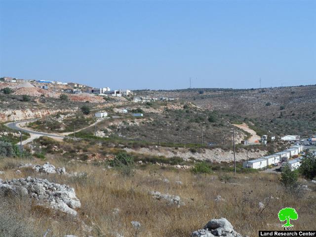 Revava colonists clog water well with rocks and lay down landmarks to open colonial road in Deir Istiya village