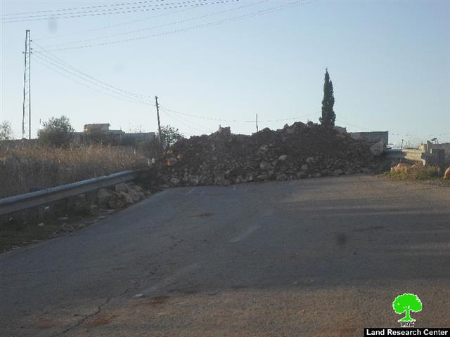 Sealing off the entrance of ‘Abud village, north Ramallah city