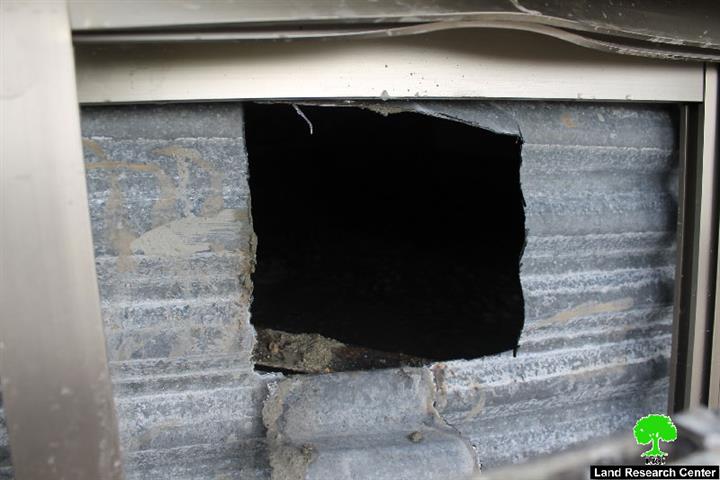 Israeli forces pump cement into the residence of Martyr Alaa Abu Jamal in the area of Jabal Al-Mukabbir