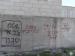 Israeli Colonists Write Offensive and Racist slogans on a Palestinian House