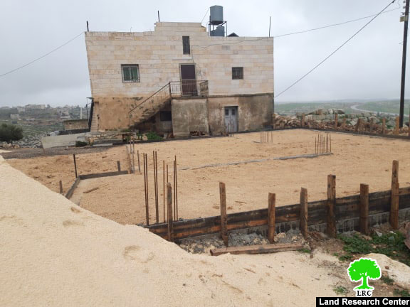 Serving Halt of work order on a house in As-Semya/ Hebron governorate