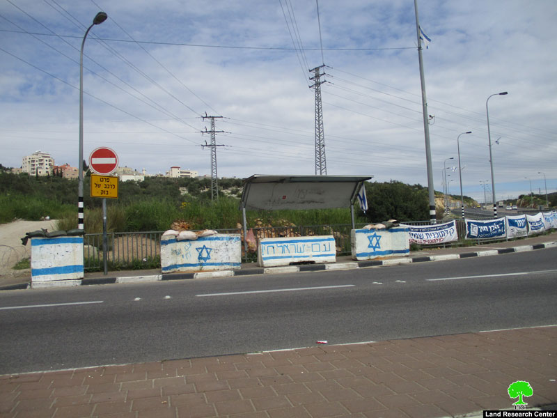 Settlers write hatred inciting slogans on the roadsides of bypass 5 – Haris / Salfit governorate