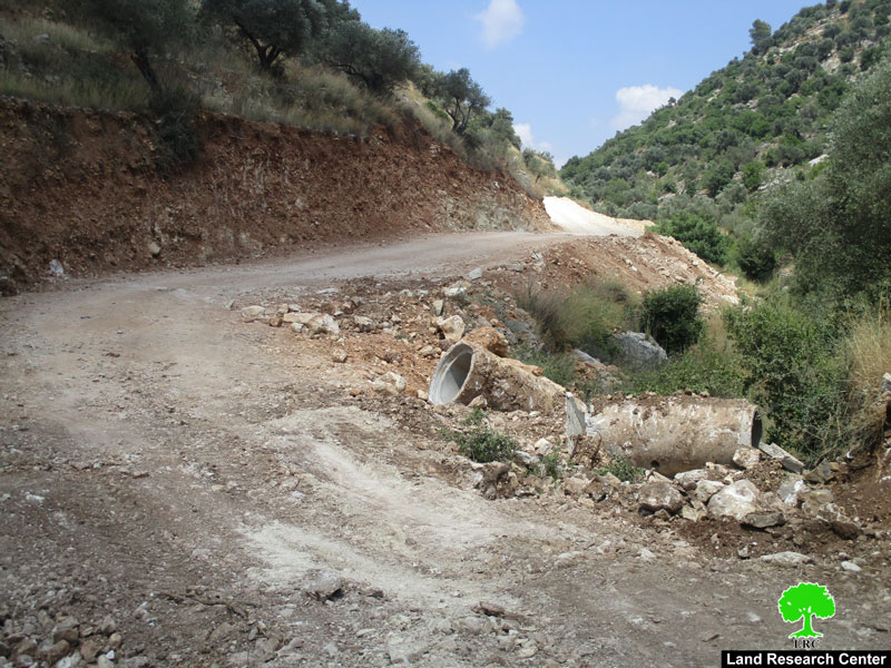 Ravaging a segment of an agricultural road North Deir Ghassana village/ Ramallah Governorate
