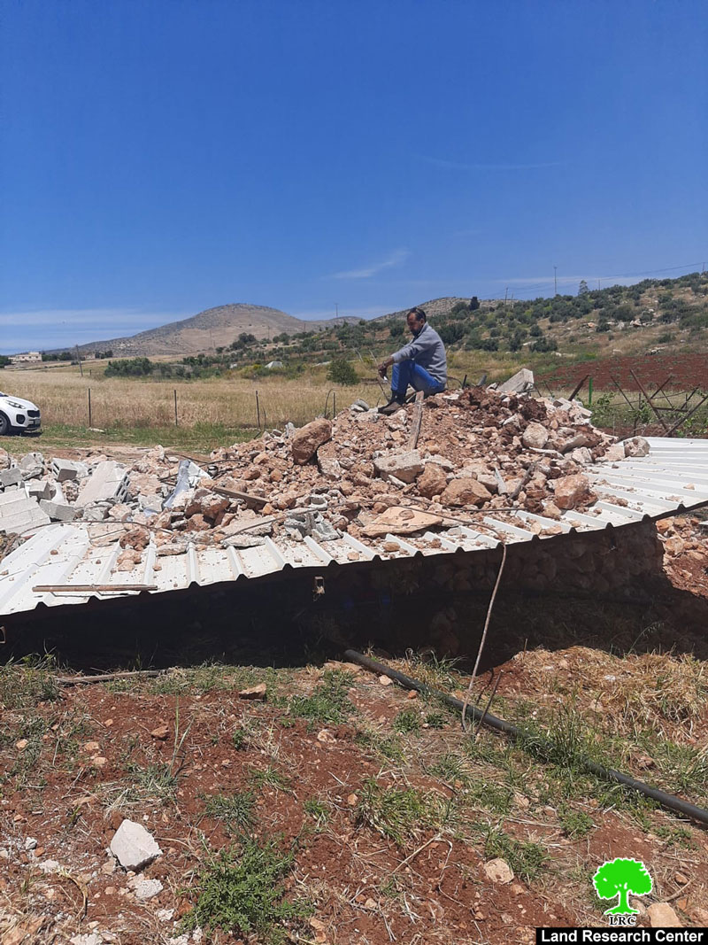 Demolishing an agricultural room and a water harvesting cistern in Al-Aqaba village / Tubas governorate